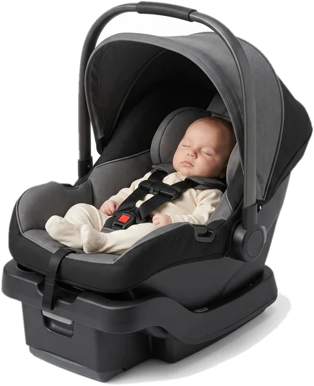 Baby sleeping in a rear-facing infant car seat